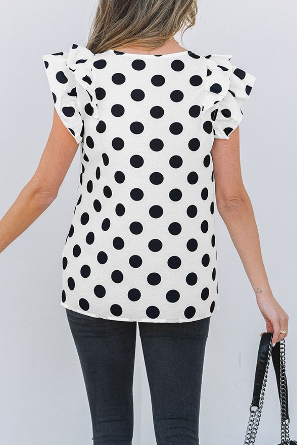 Polka Dot Ruffled Cap Sleeve V Neck Blouse.