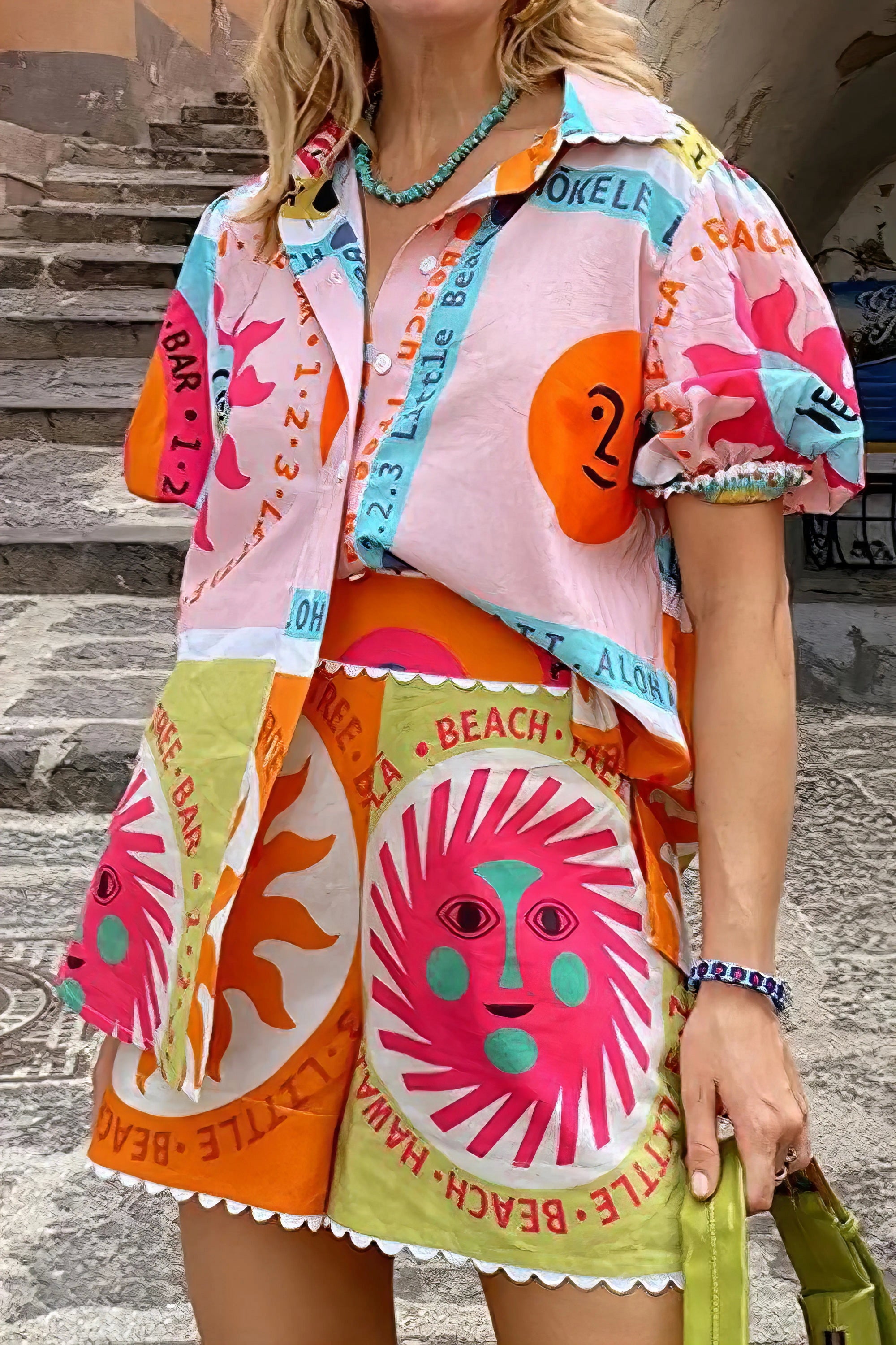 printed button down shirt and shorts set, stylish women's two-piece outfit, coordinated summer fashion, comfortable printed set, casual chic ensemble, perfect for a put-together look