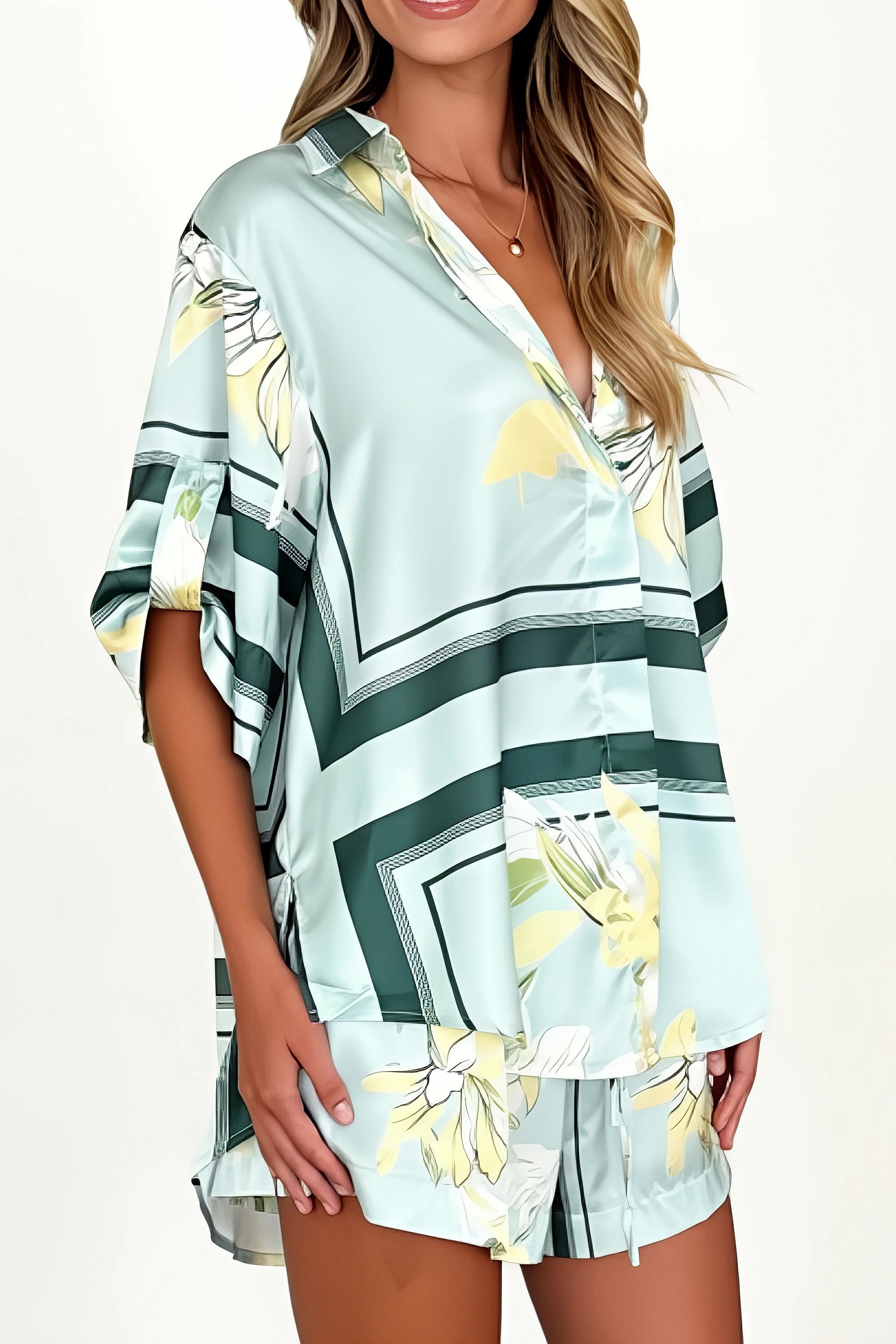printed collared neck top and shorts set, polished women's two-piece outfit, classic style summer fashion, comfortable printed set, buttoned top, tailored shorts, sophisticated casual wear