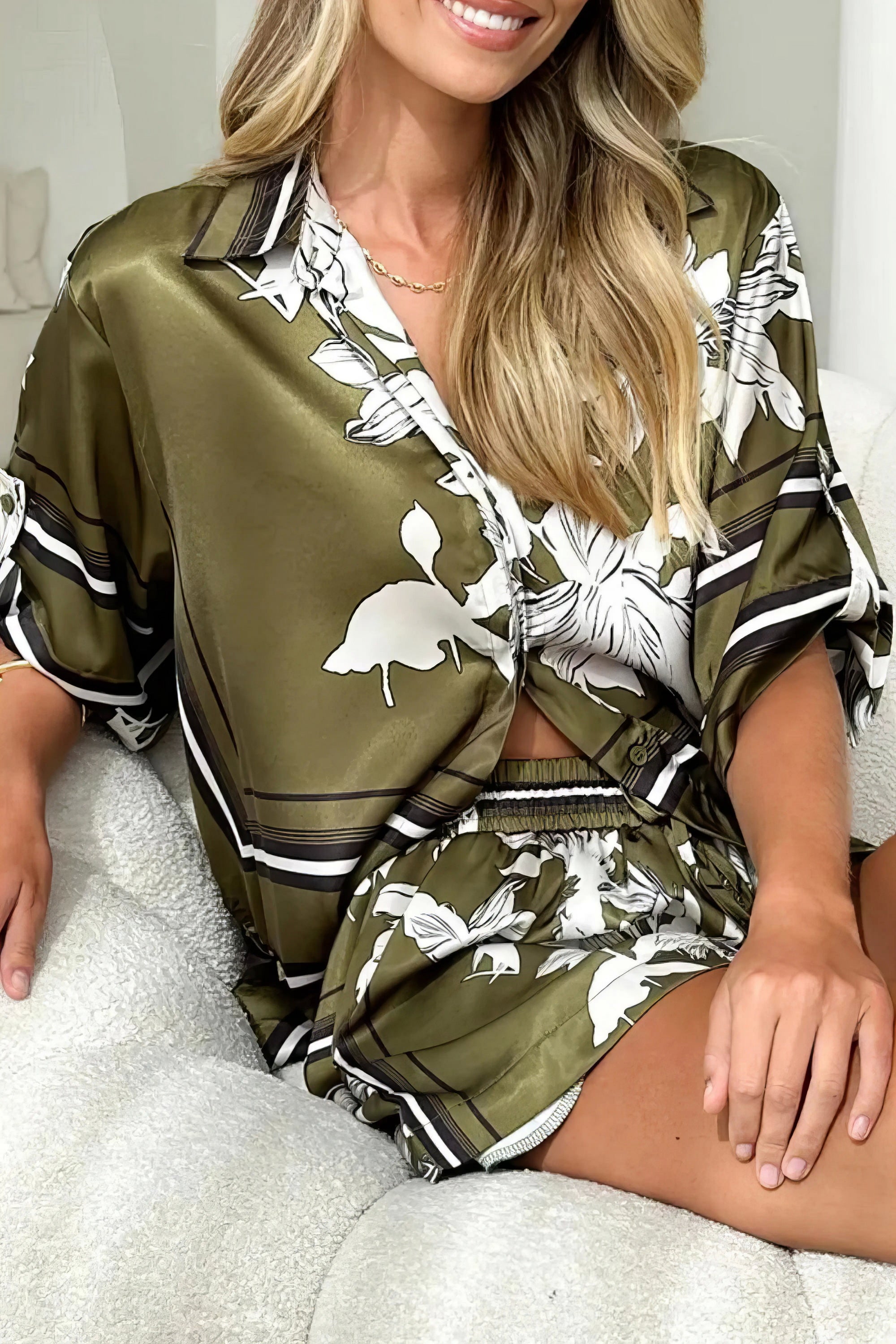 printed collared neck top and shorts set, polished women's two-piece outfit, classic style summer fashion, comfortable printed set, buttoned top, tailored shorts, sophisticated casual wear