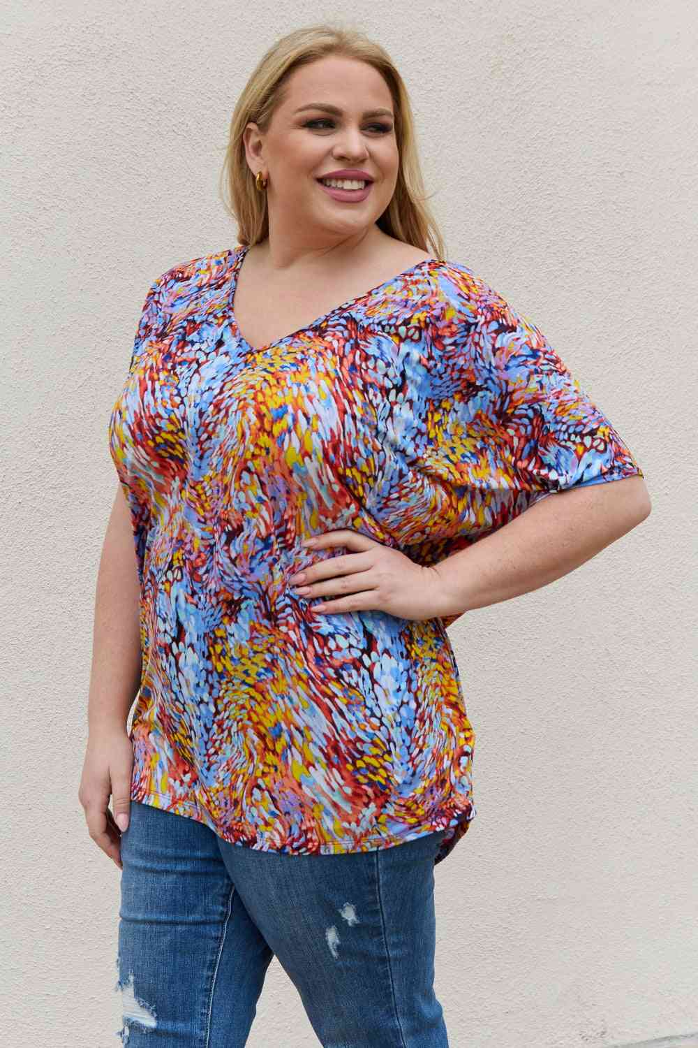 Be Stage full size Printed Dolman Flowy Top.