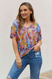 Be Stage full size Printed Dolman Flowy Top.