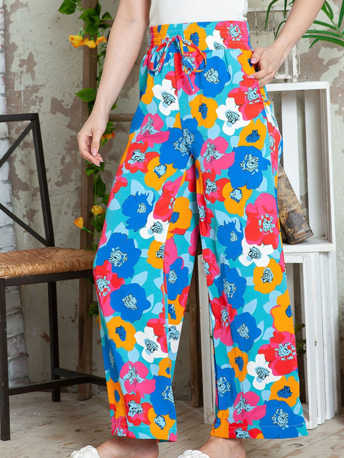 Printed drawstring wide leg pants with pockets, opaque.