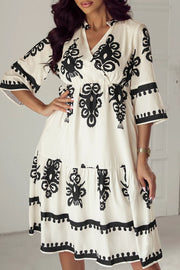 Printed Half Sleeve Knee Length Dress.