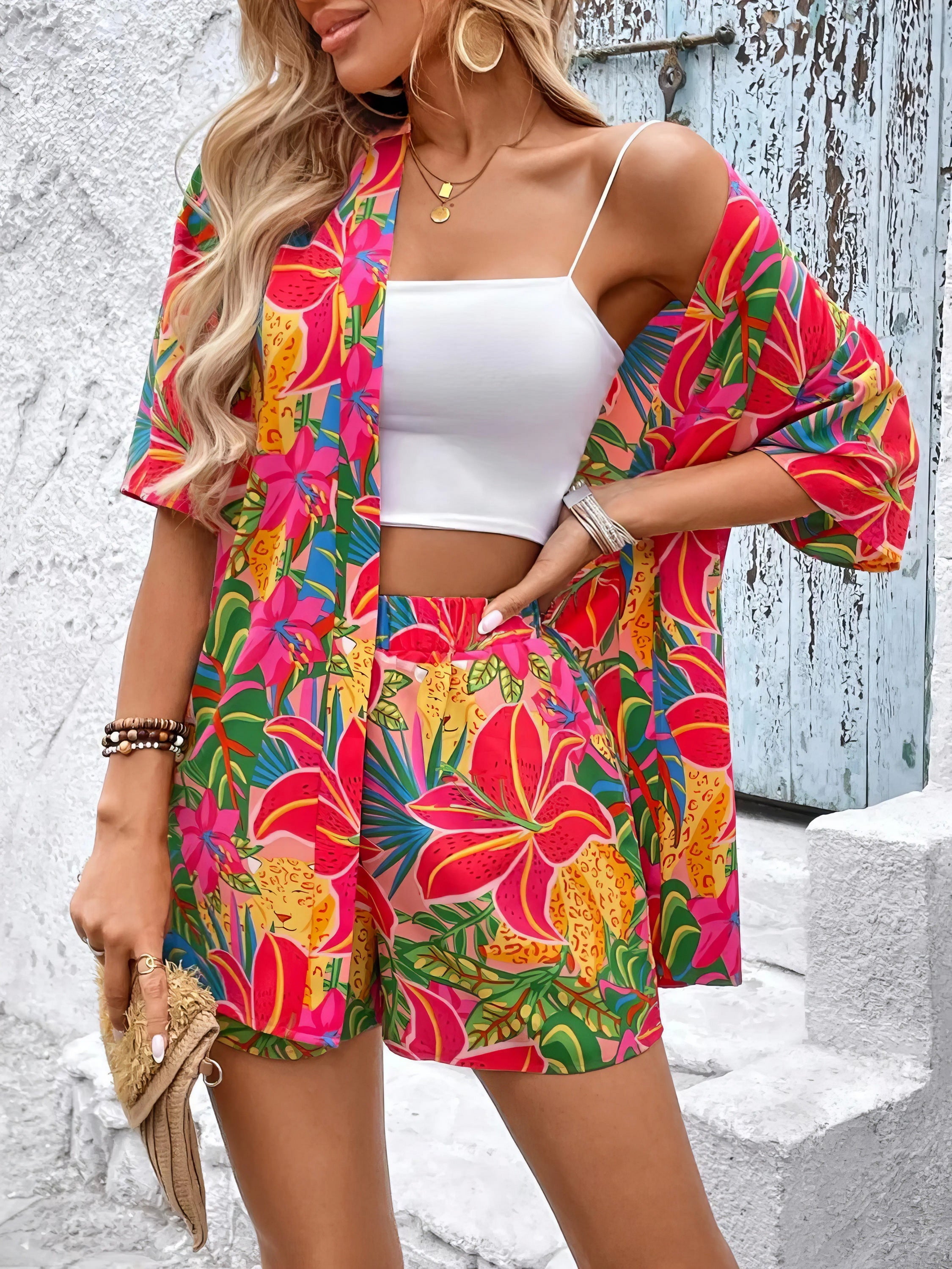 printed half sleeve top and shorts set, casual chic women's two-piece outfit, relaxed fit summer fashion, comfortable printed set with pockets, versatile everyday ensemble
