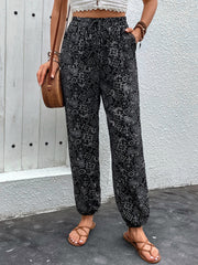 Printed high waist pants with tie and pockets, opaque.