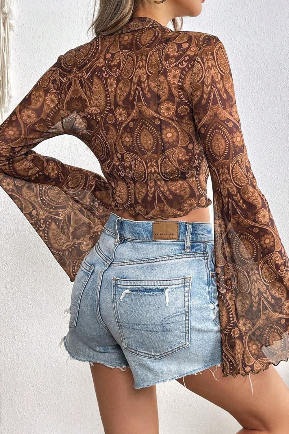 Printed Mock Neck Flare Sleeve Top.