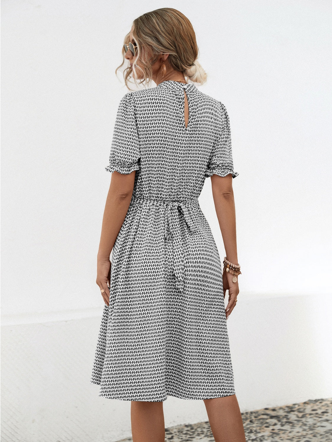 Printed Mock Neck Flounce Sleeve Dress.