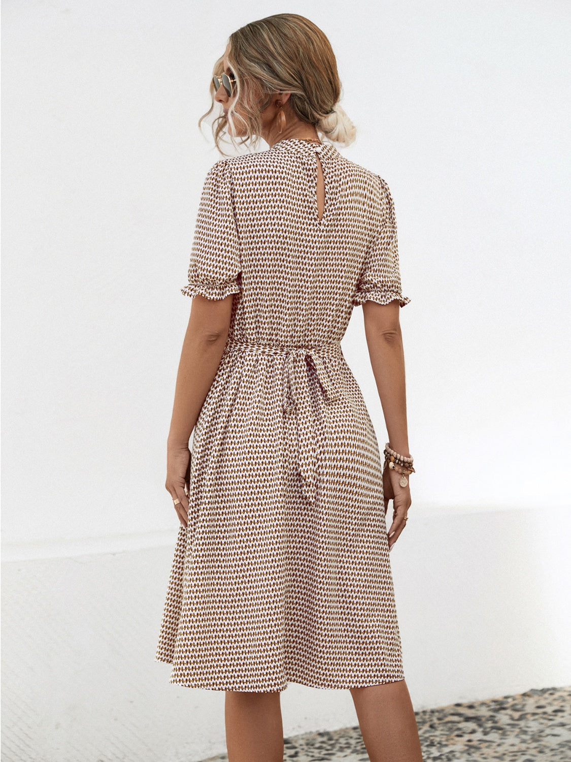 Printed Mock Neck Flounce Sleeve Dress.