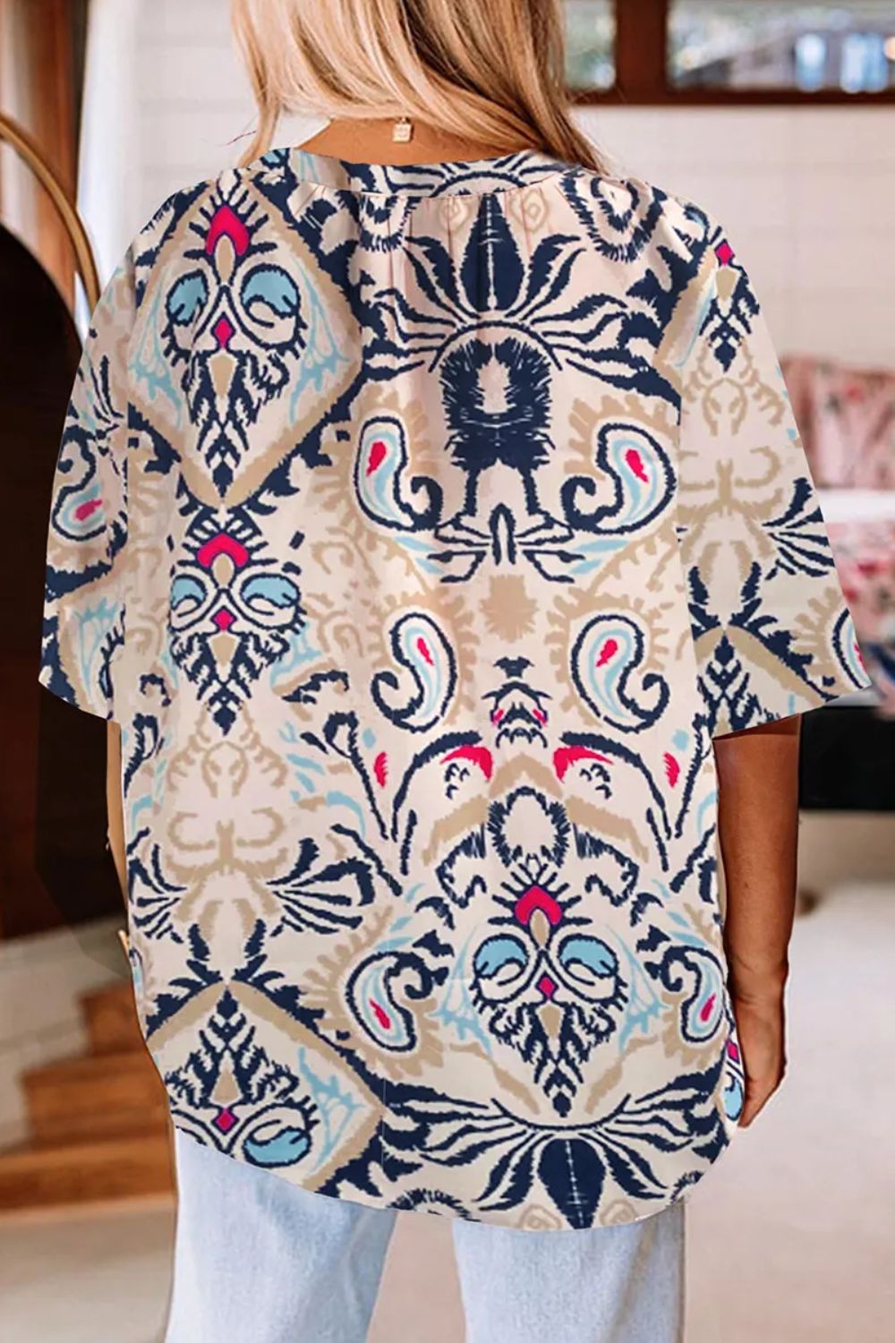 Printed Notched Half Sleeve Blouse.