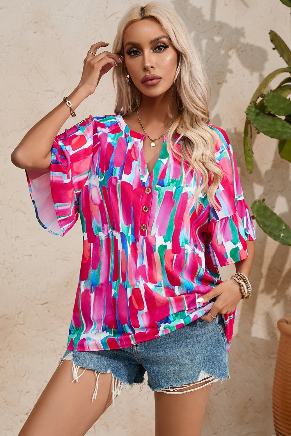 Printed Notched Half Sleeve Blouse.