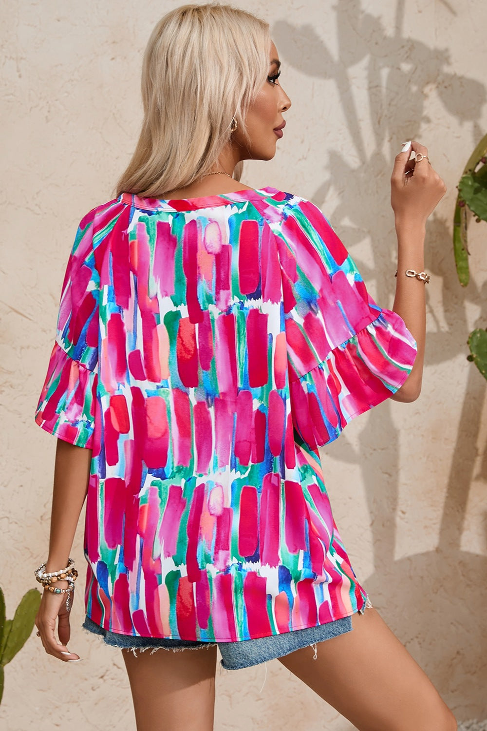 Printed Notched Half Sleeve Blouse.