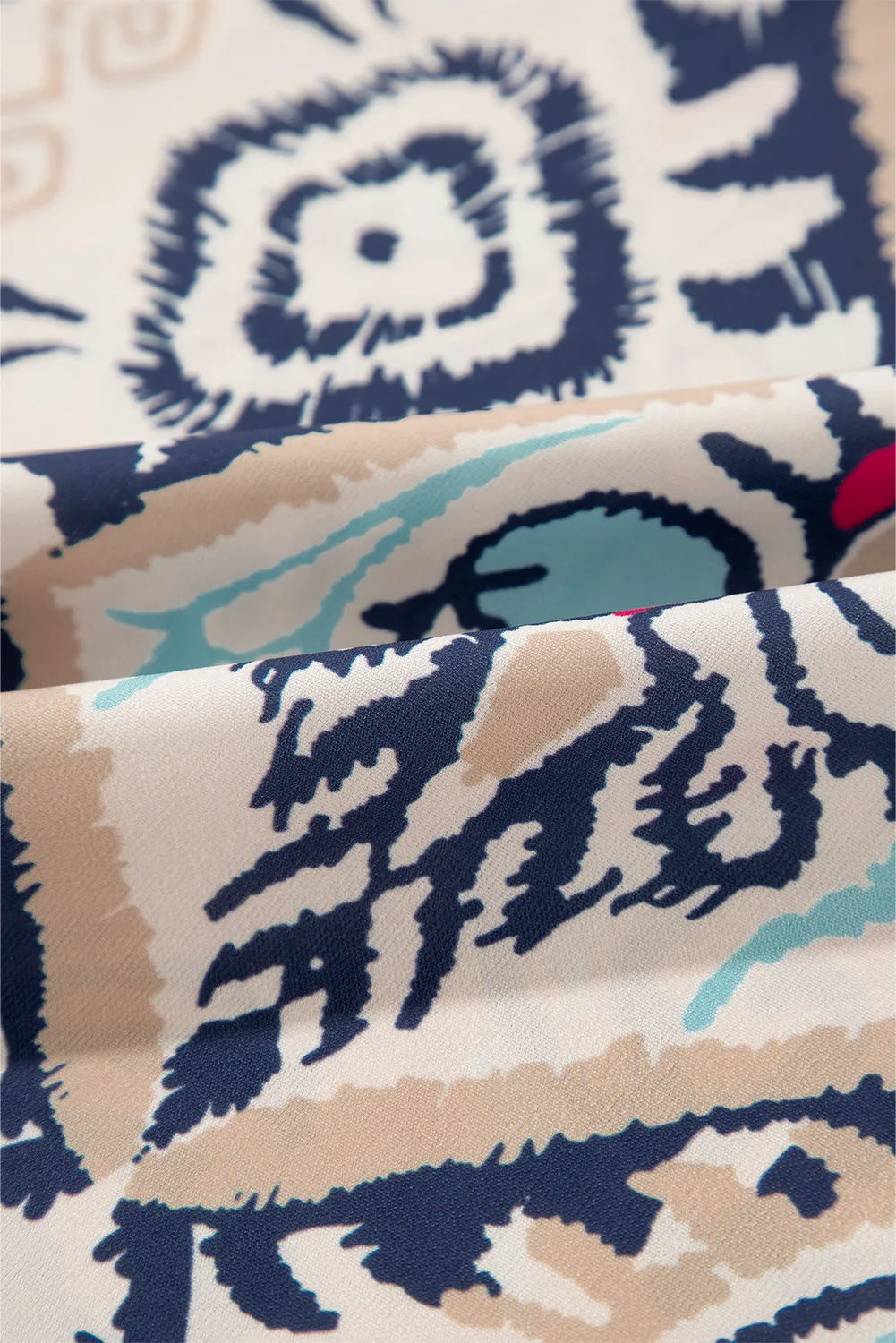 Printed Notched Half Sleeve Blouse.