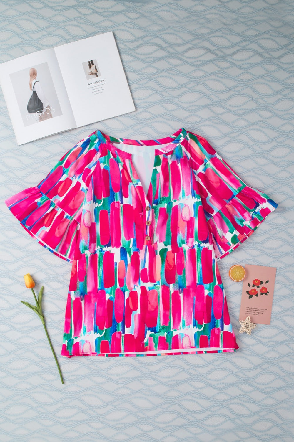 Printed Notched Half Sleeve Blouse.