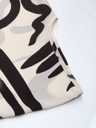 Perfee Printed Notched Half Sleeve Blouse.