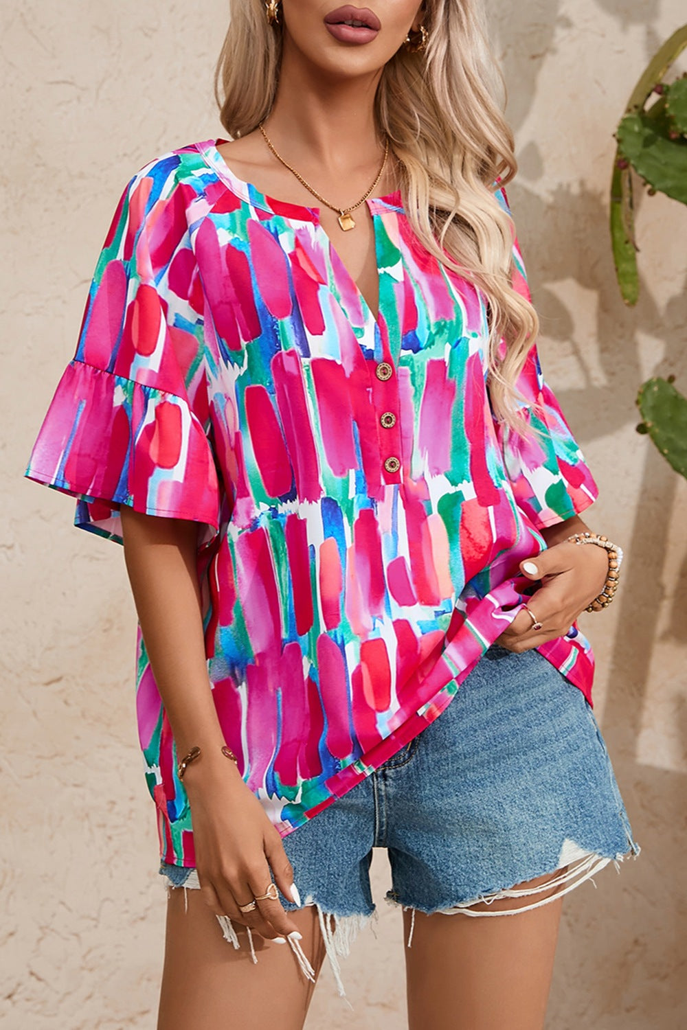 Printed Notched Half Sleeve Blouse.