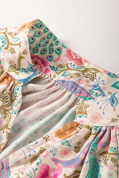 Printed Notched Lantern Sleeve Dress.