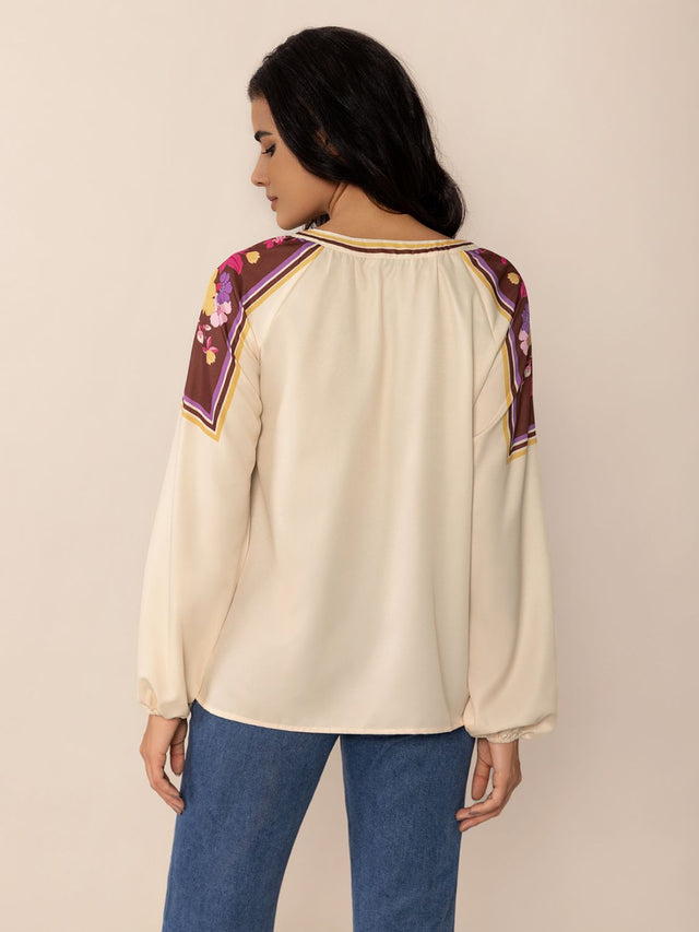 Printed Notched Long Sleeve Blouse.