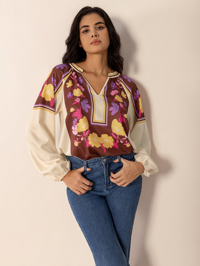 Printed Notched Long Sleeve Blouse.