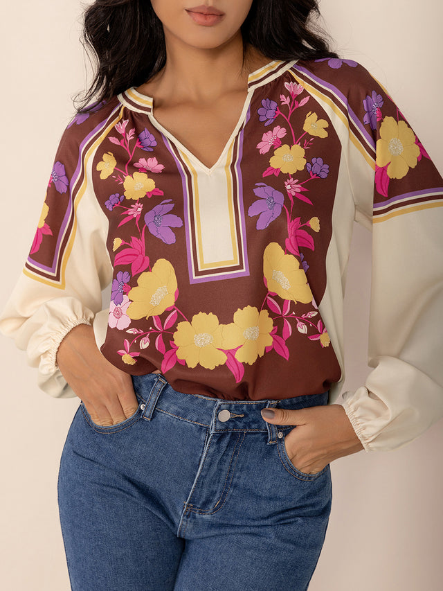 Printed Notched Long Sleeve Blouse.
