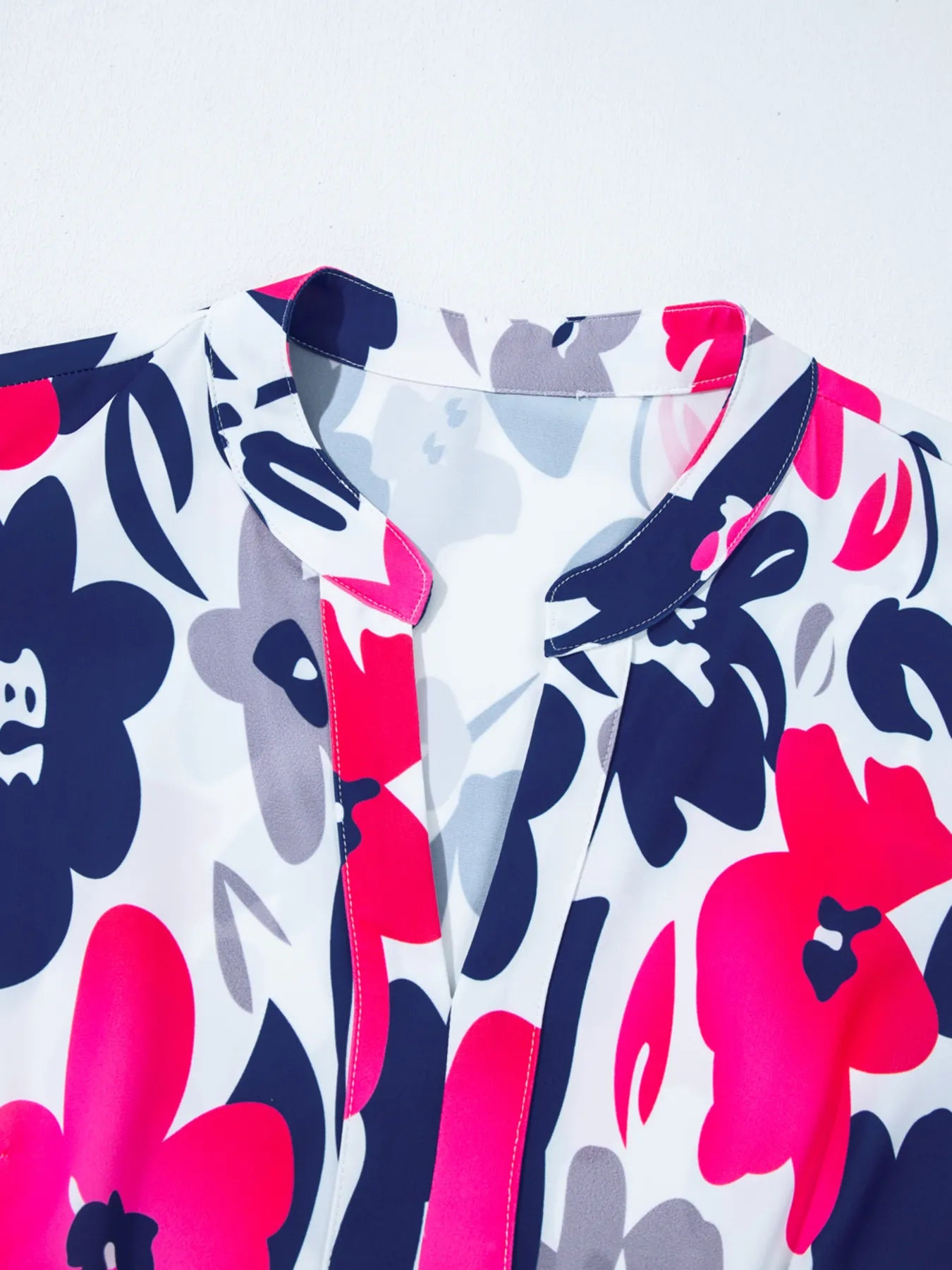 Printed Notched Neck Flutter Sleeve Mini Dress.