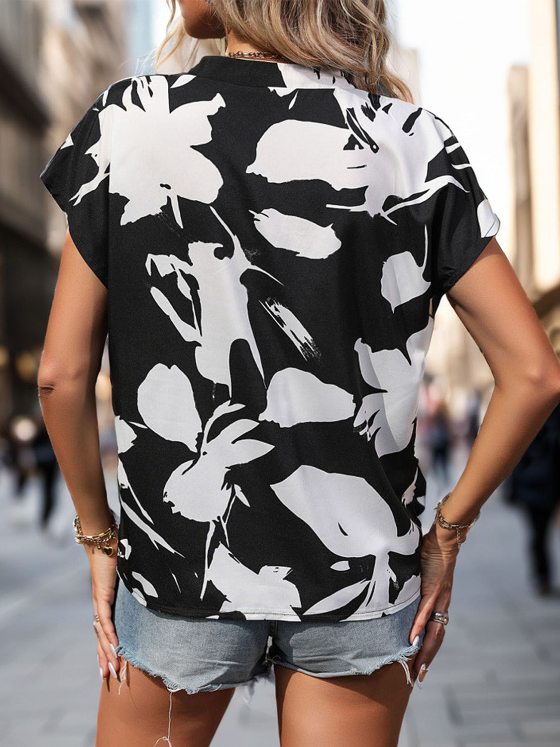 Perfee Printed Notched Short Sleeve Blouse.