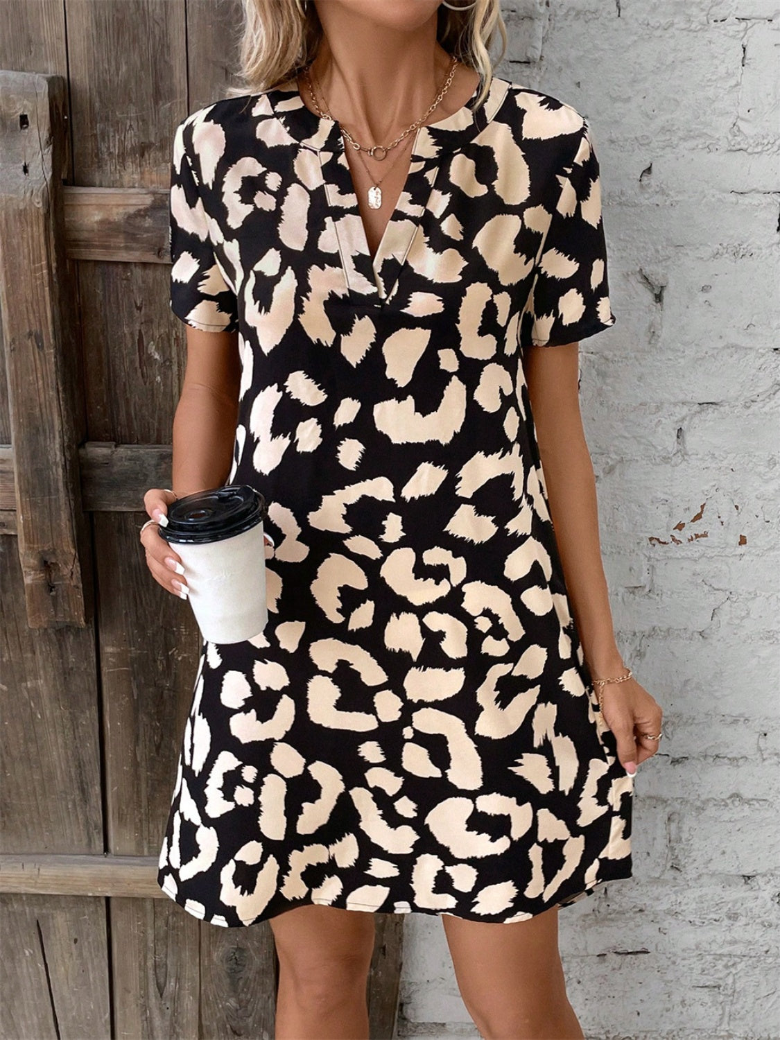Printed Notched Short Sleeve Mini Dress.