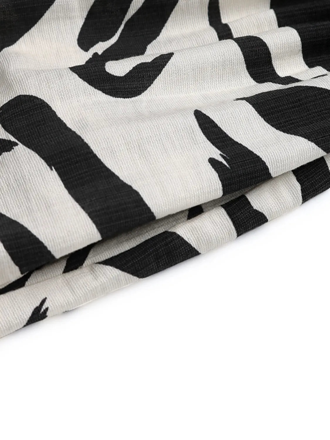 Printed Notched Sleeveless Midi Dress.