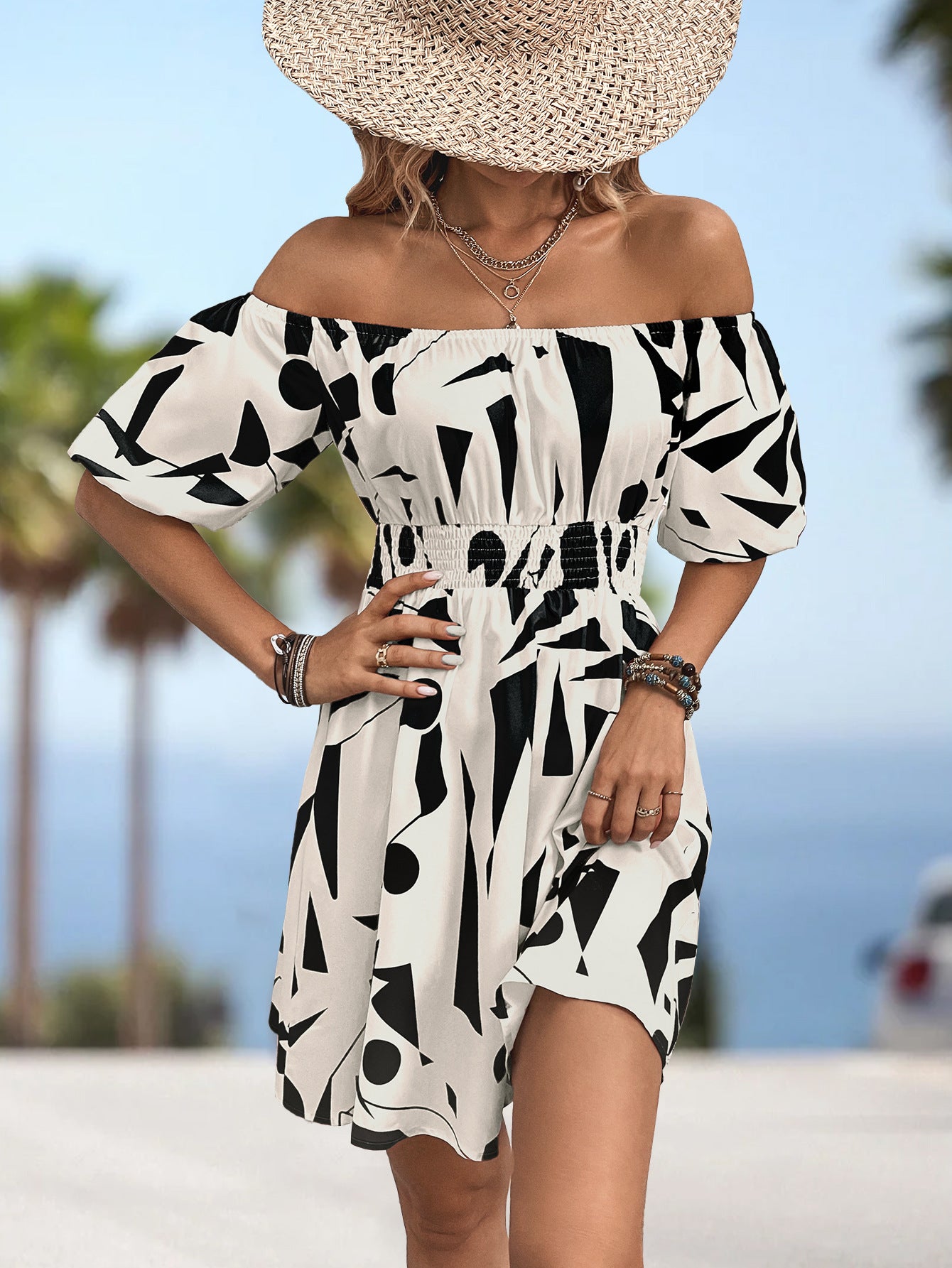 Printed Off-Shoulder Smocked Waist Dress.