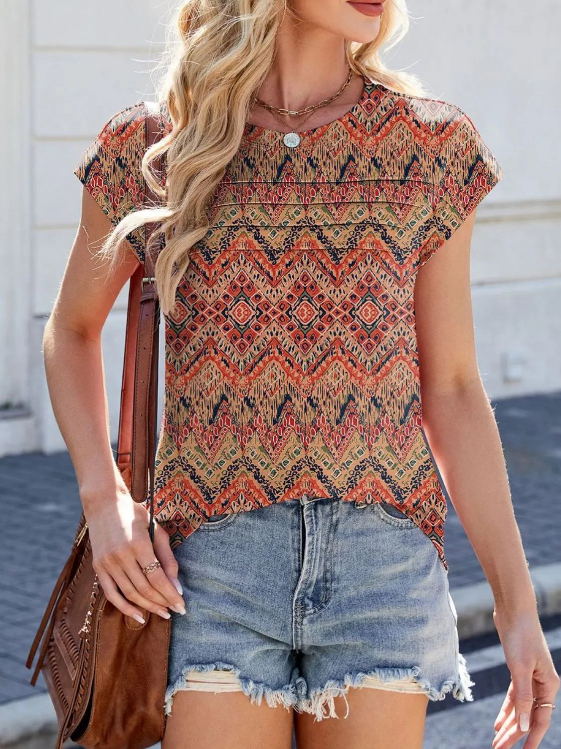 Printed Round Neck Cap Sleeve Top.