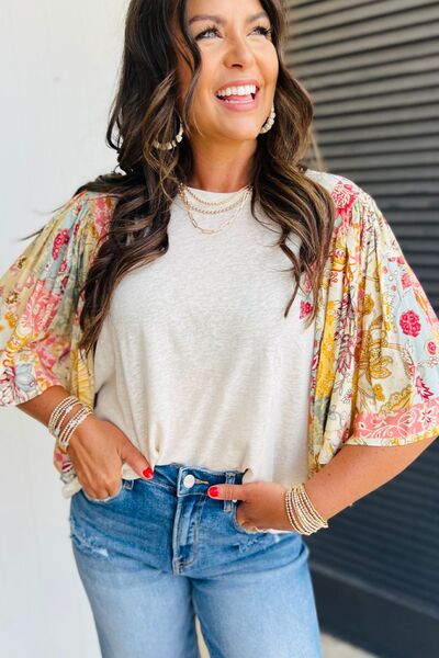 Printed Round Neck Flutter Sleeve Blouse.