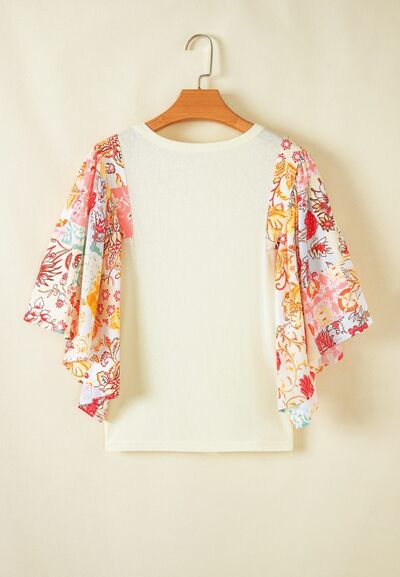 Printed Round Neck Flutter Sleeve Blouse.