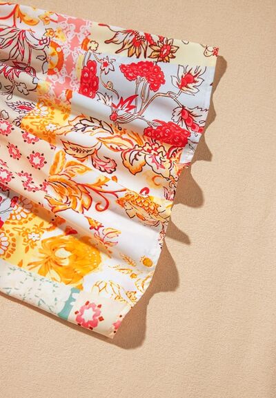 Printed Round Neck Flutter Sleeve Blouse.