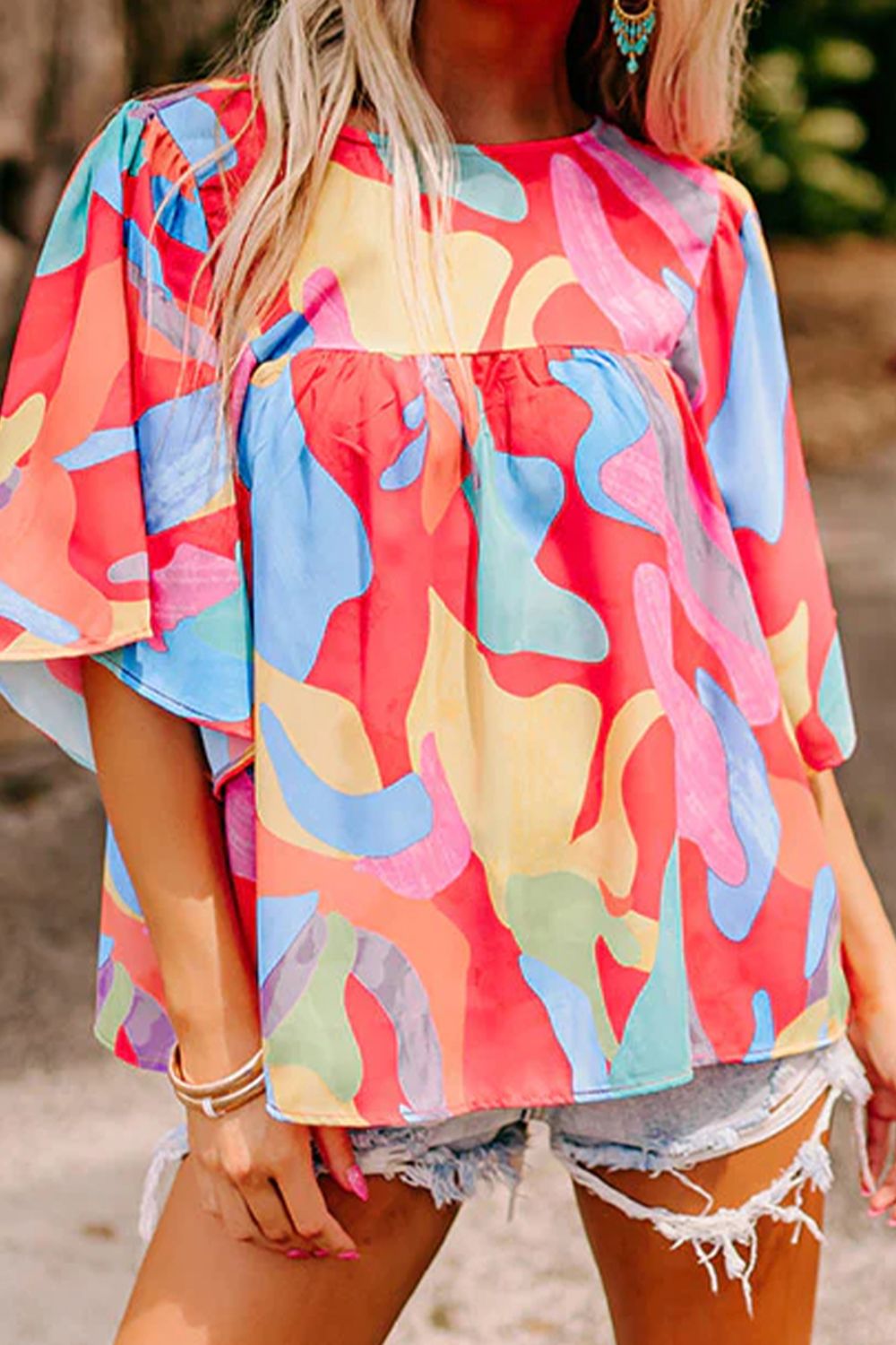 Printed Round Neck Half Sleeve Blouse.