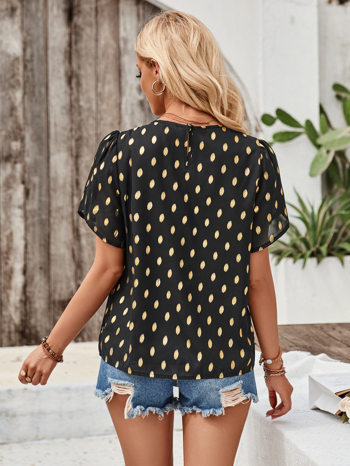 Printed Round Neck Petal Sleeve Blouse.