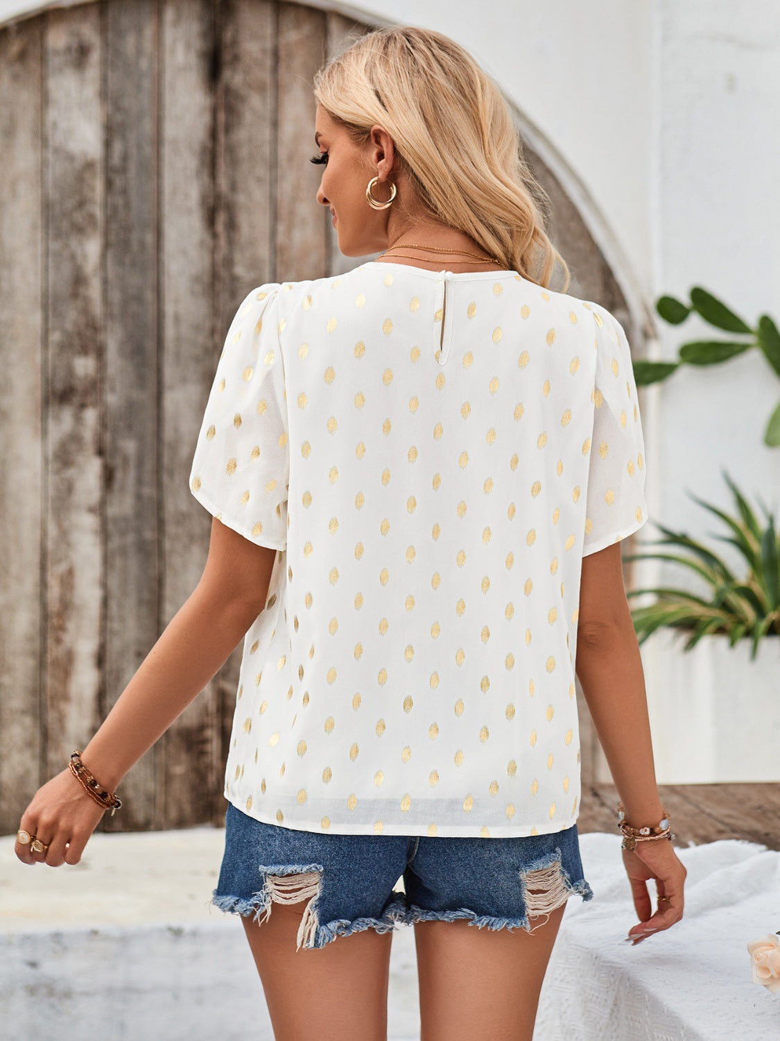 Printed Round Neck Petal Sleeve Blouse.