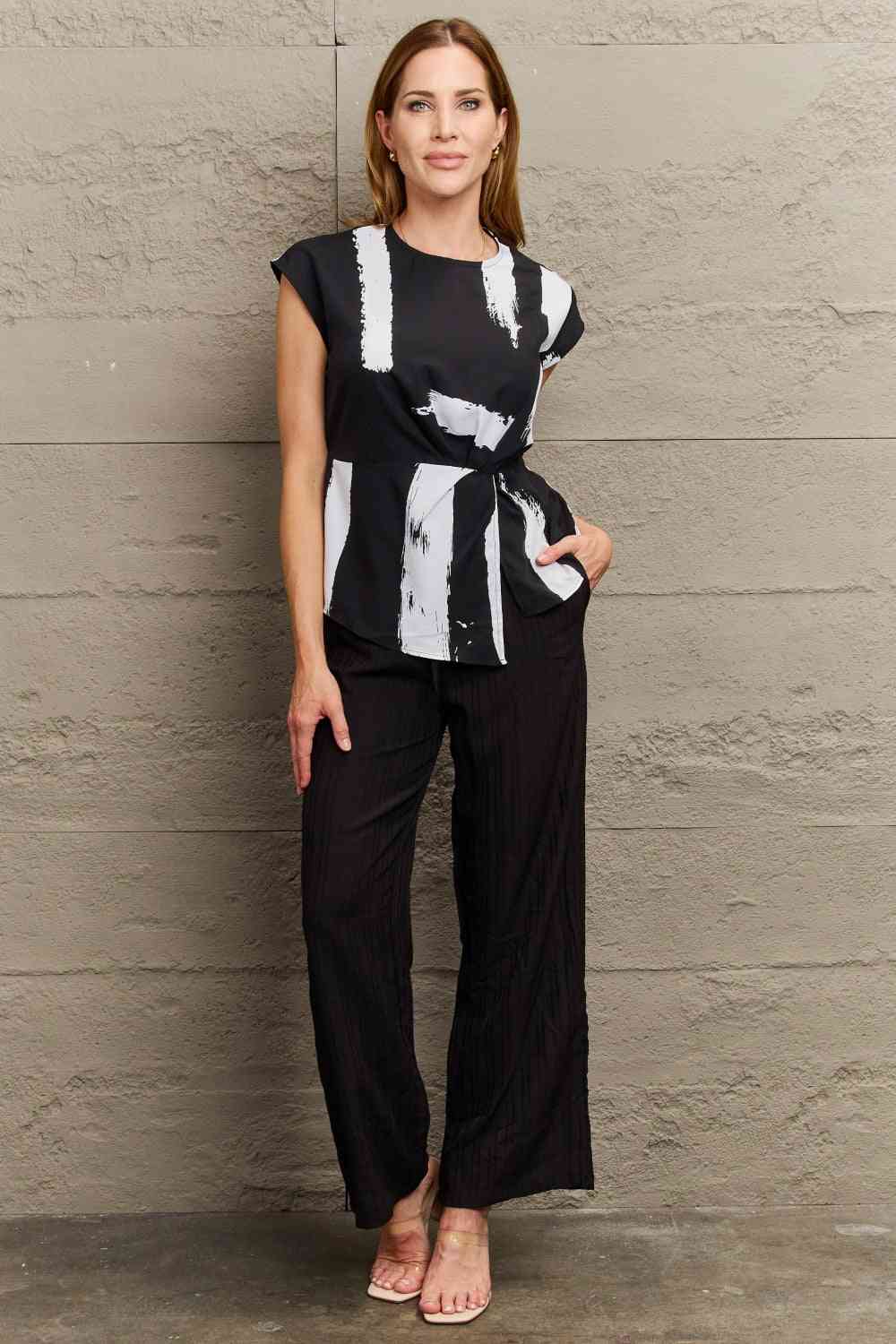 Perfee Printed Round Neck Short Sleeve Blouse.