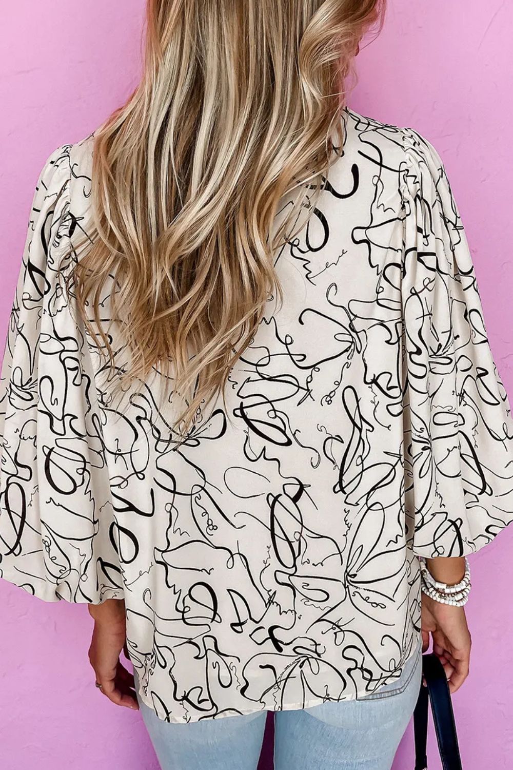 Printed Round Neck Three-Quarter Sleeve Blouse.