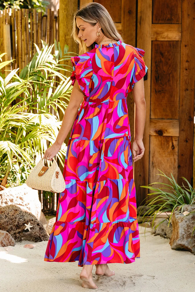 Printed Ruffled Mock Neck Tiered Dress.
