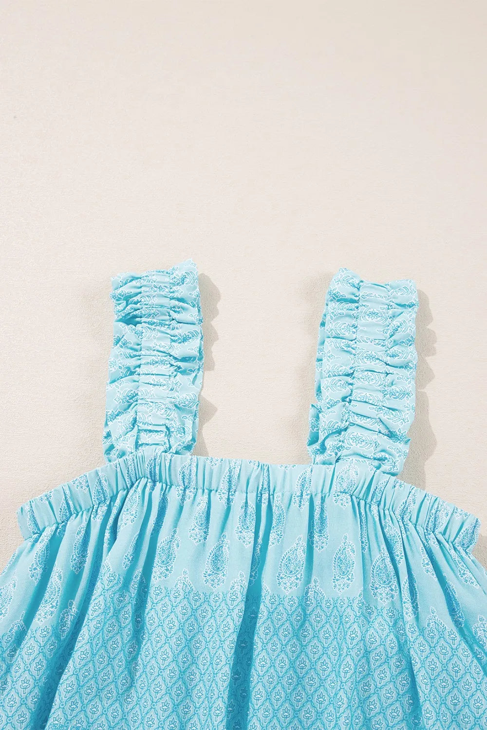 Printed ruffled wide straps tank top with tiered frill.