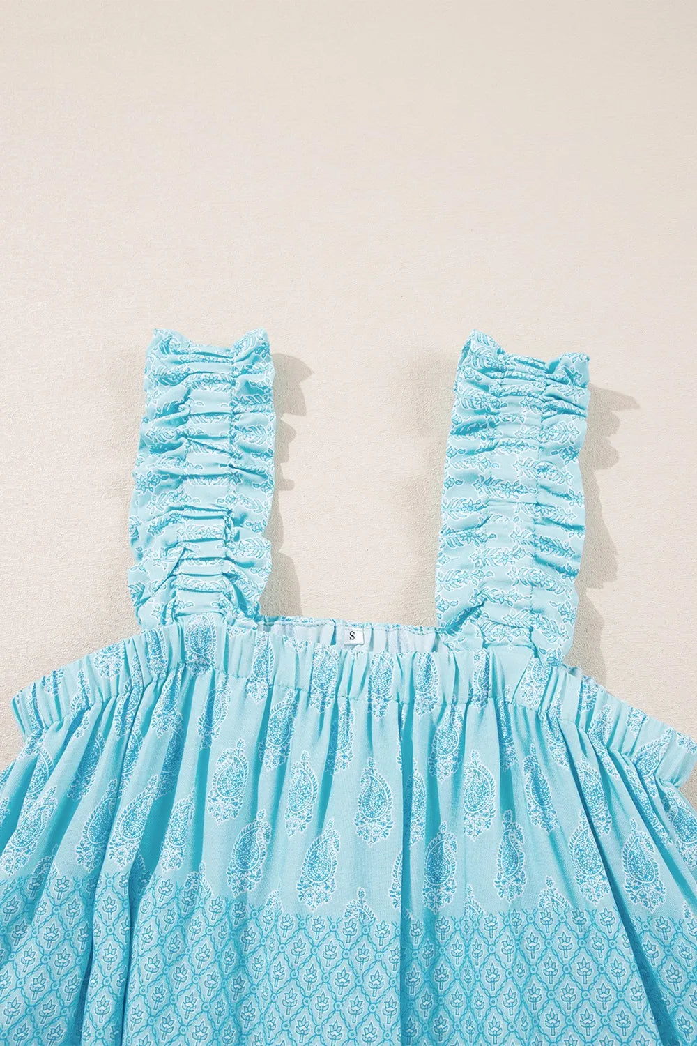 Printed ruffled wide straps tank top with tiered frill.