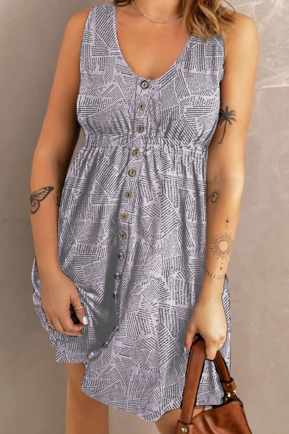 Double Take Printed Scoop Neck Sleeveless Buttoned Magic Dress with Pockets.