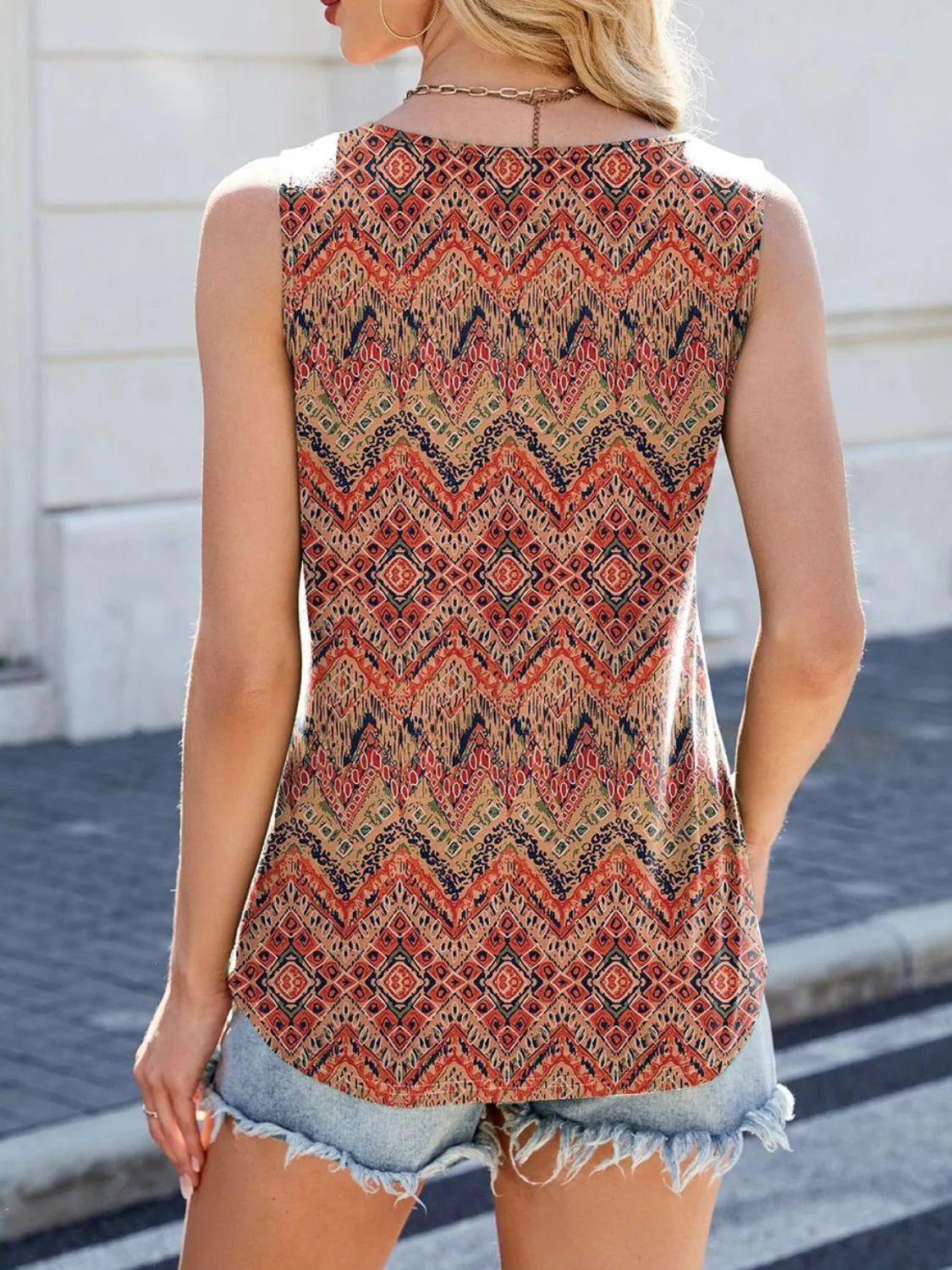 Printed scoop neck wide strap tank top with pleats.