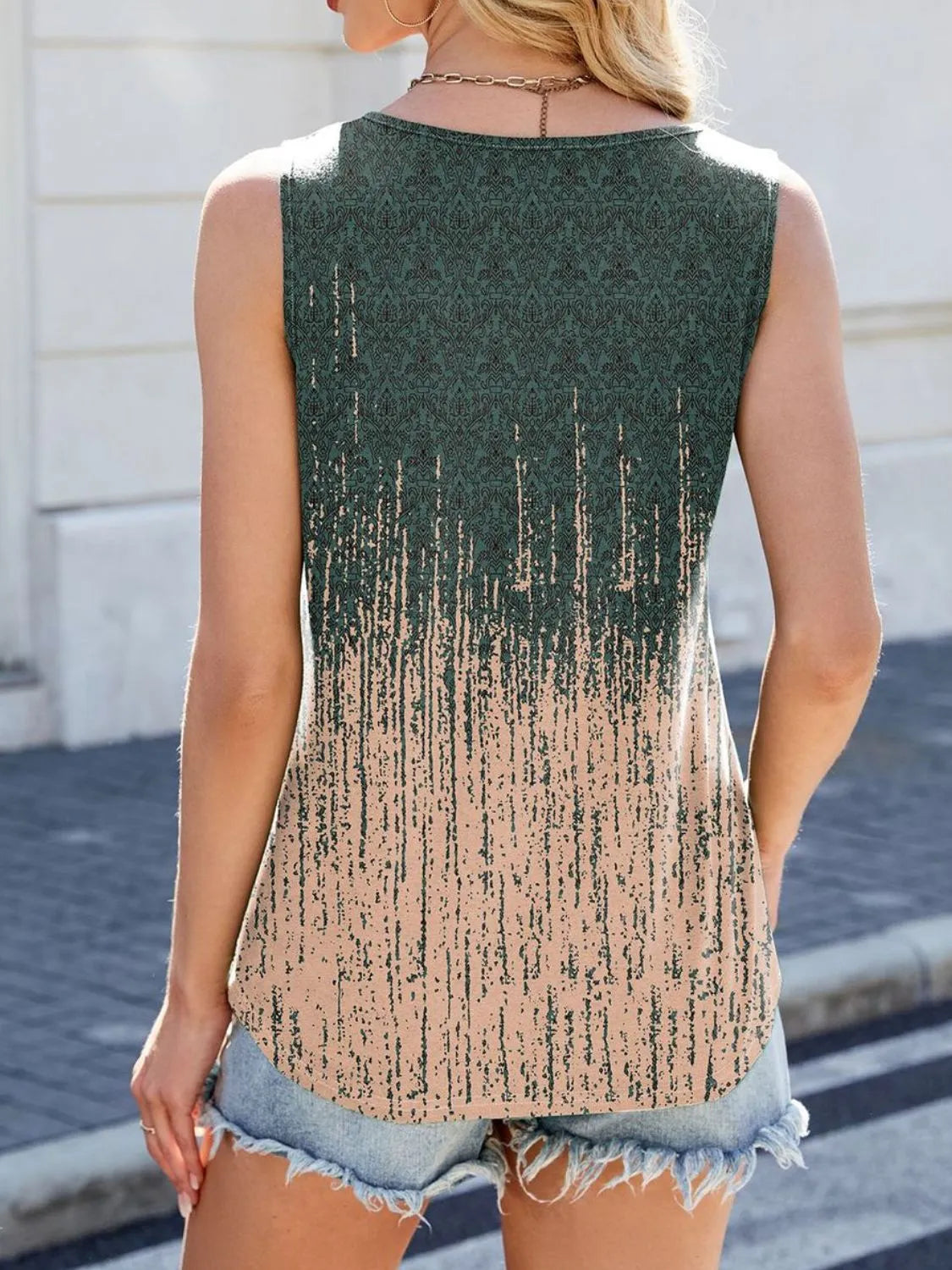 Printed scoop neck wide strap tank top with pleats.