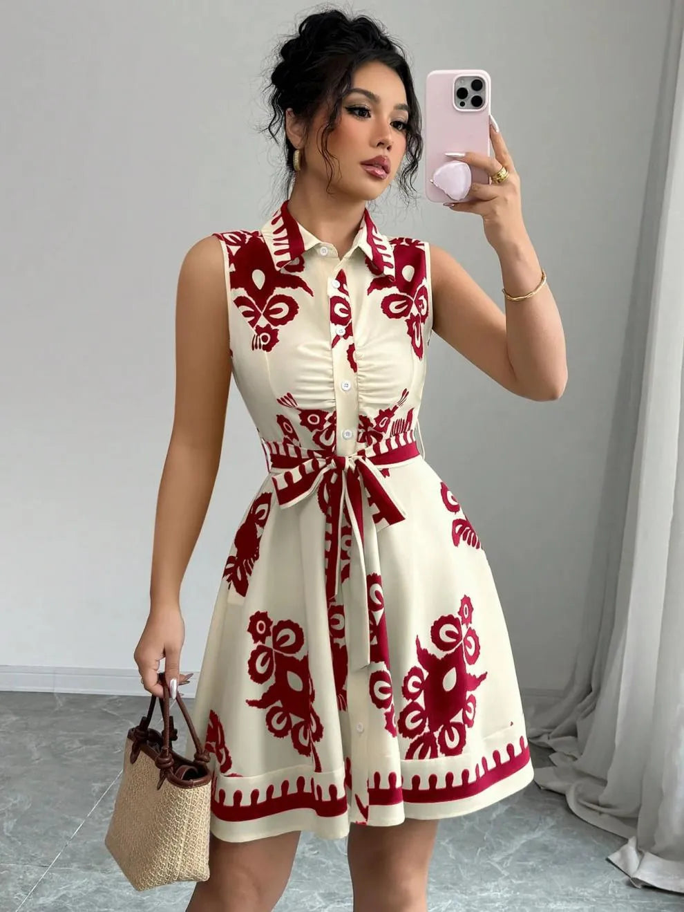 Printed Sleeveless Button Front Dress.