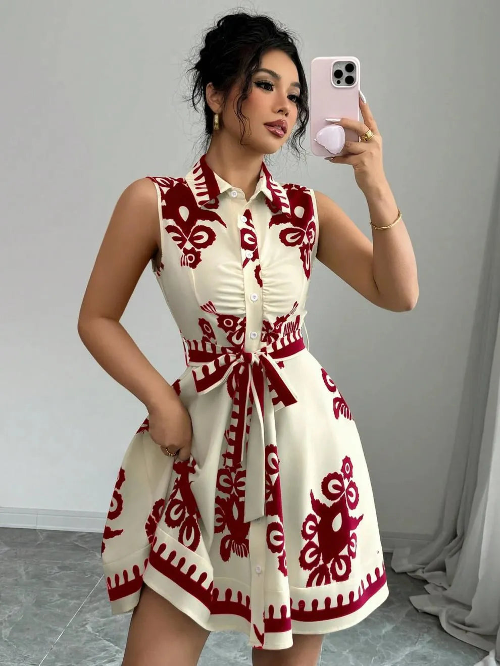 Printed Sleeveless Button Front Dress.