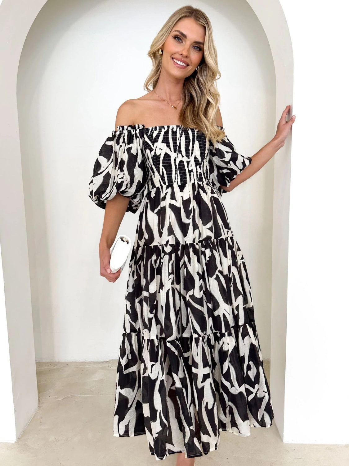 Printed Smocked Off-Shoulder Tiered Dress.