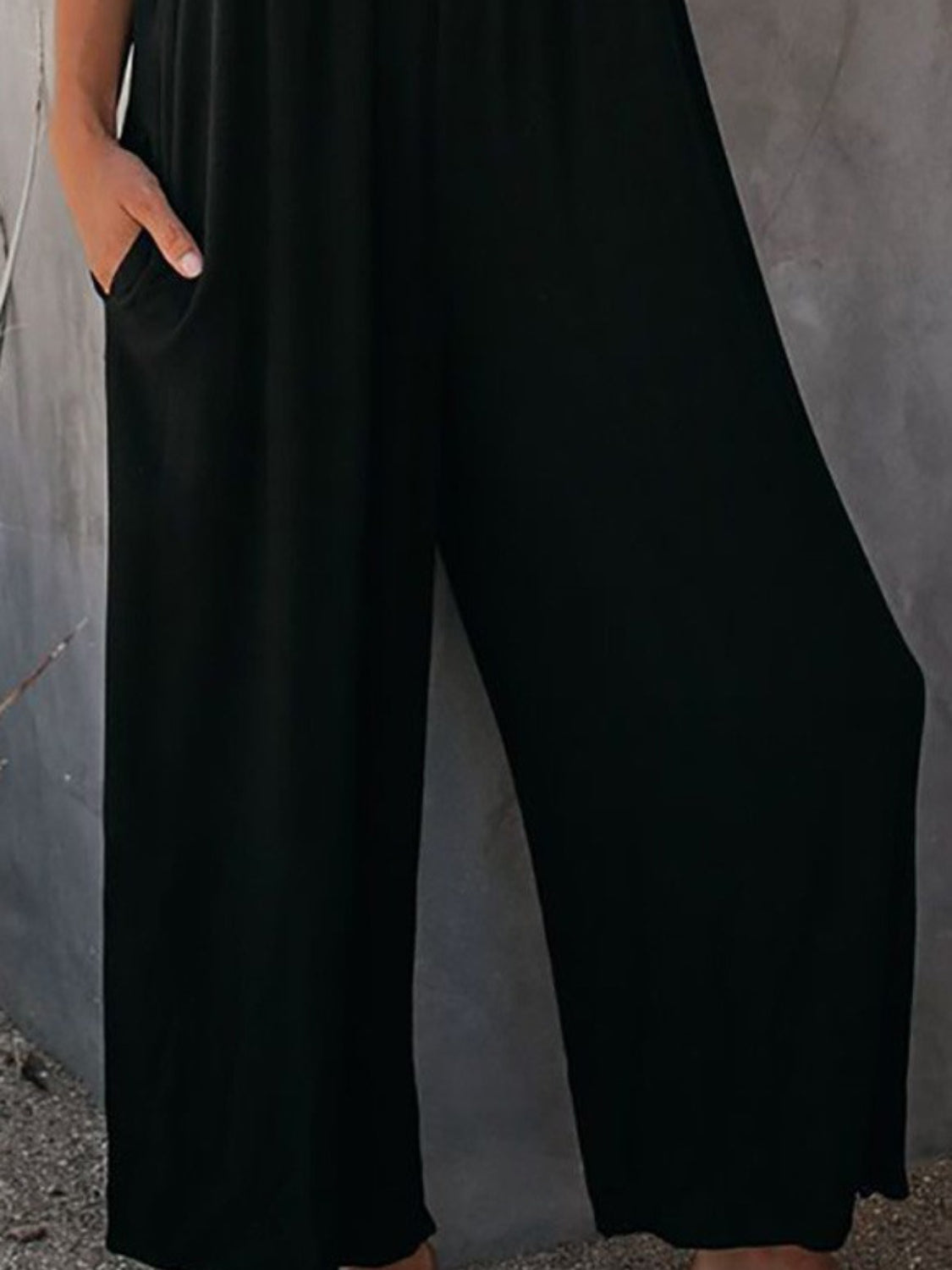 Printed Spaghetti Strap Jumpsuit with Pockets.