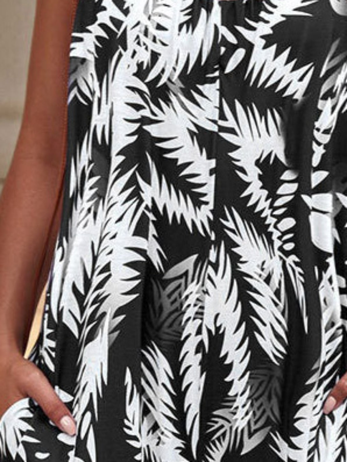 Printed Spaghetti Strap Jumpsuit with Pockets.