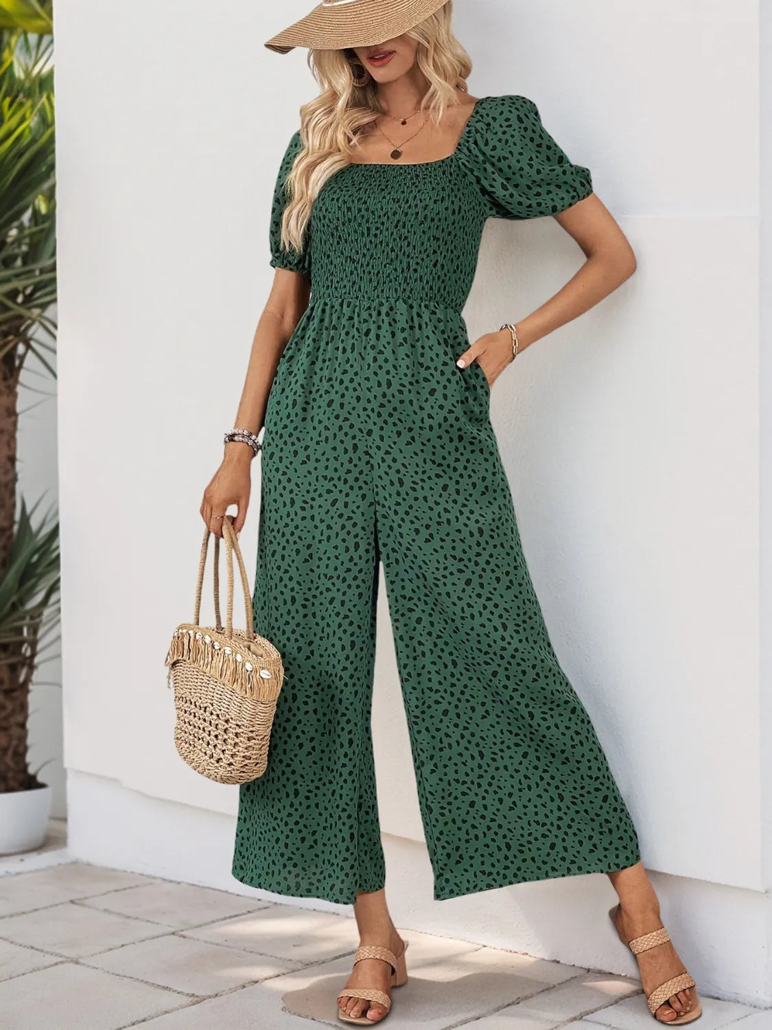 Printed Square Neck Puff Sleeve Jumpsuit with Smocked Detail and Pockets.